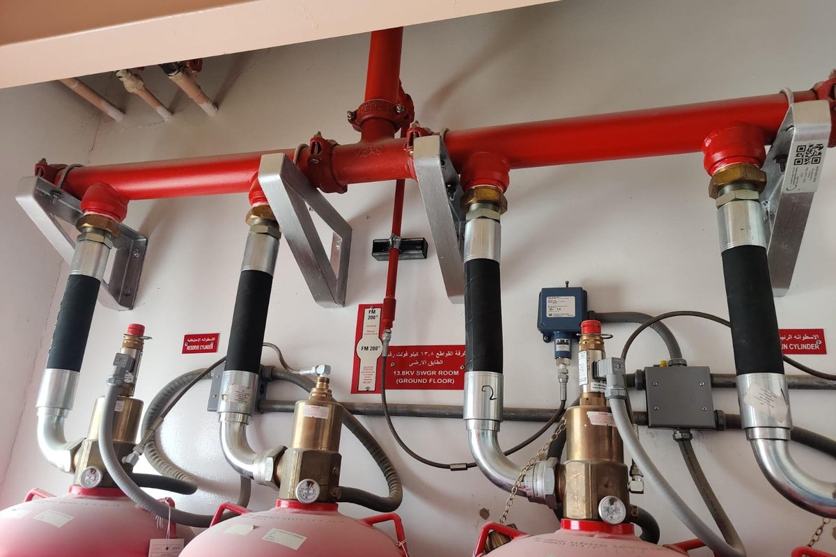 Spring International team reviewing plans on site